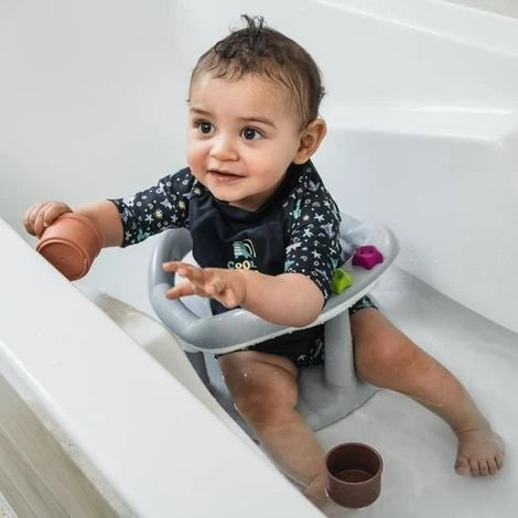 Thermobaby Aquababy Grey Bath Seat with baby seated in a bathtub