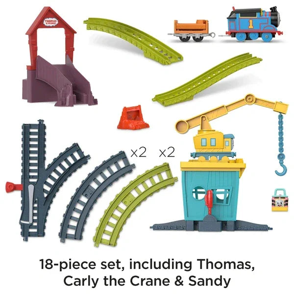 Full contents of the Fix Em Up Friends motorised playset showing Thomas, Carly, Sandy and all included track pieces