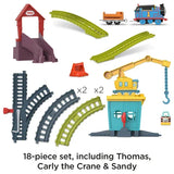 Full contents of the Fix Em Up Friends motorised playset showing Thomas, Carly, Sandy and all included track pieces