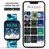 Tikkers blue camouflage smartwatch displayed beside a smartphone showing the Tikkers Time app and twelve different digital and analogue watch face designs.