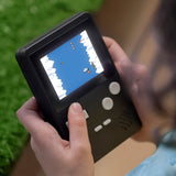 Tikkers Handheld Console held in two hands while playing a game