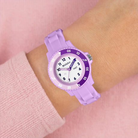 Tikkers Lilac Silicone Time Teacher Watch worn on the wrist with lilac silicone strap and purple time teacher dial