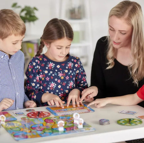 Children playing Times Tables Heroes game by Orchard Toys Ireland