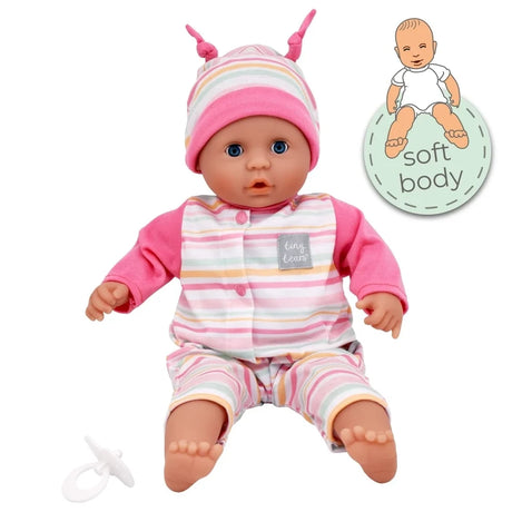 Tiny Tears Baby Soft doll in striped outfit with dummy and soft body badge