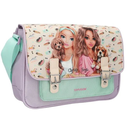 Angled TOPModel SUNNY DOG shoulder bag with two illustrated girls holding dogs, a small dog print and a mint green shoulder strap.