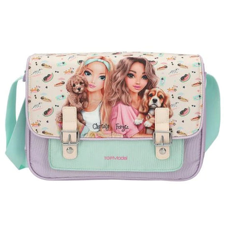 Front of the TOPModel SUNNY DOG shoulder bag with two illustrated girls holding dogs, a small dog print and a mint green front pocket.
