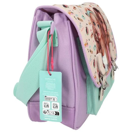 Side view of the TOPModel SUNNY DOG shoulder bag with the mint green strap and attached product tag.