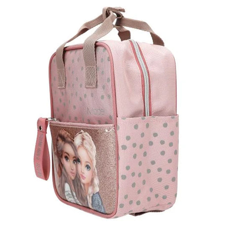 TOPModel Small Backpack DOTS angled side view with front pocket, handle and dotted side panel