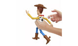 Hands holding the Toy Story 5 Running Woody figure and pulling the string on his back