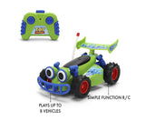 Toy Story RC Turbo Buggy feature graphic showing the green and blue two button controller beside the buggy, with large cartoon eyes and knobbly black tyres.