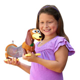 Child holding Toy Story Slinky Dog