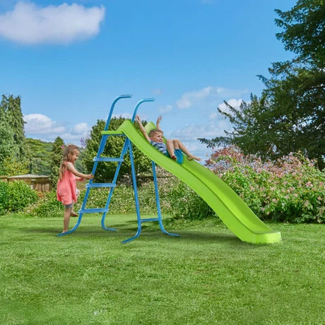 Child using the TP 8ft 2.2m Ripple Wavy Slide and Stepset outdoors
