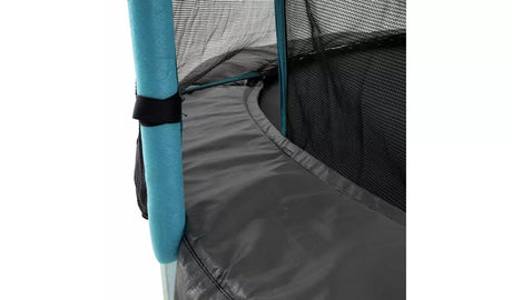 TP Up 8ft trampoline close up showing enclosure net, blue pole, black strap and grey frame padding