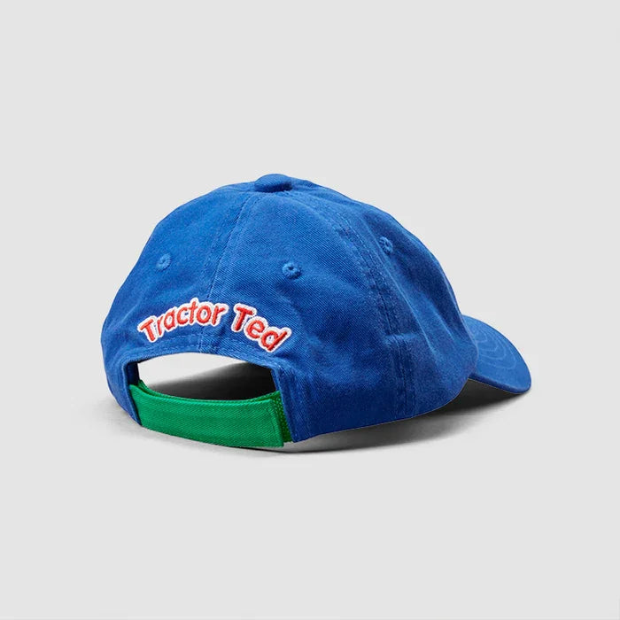 Back view of blue Tractor Ted cap showing embroidered Tractor Ted text and green adjustable velcro strap