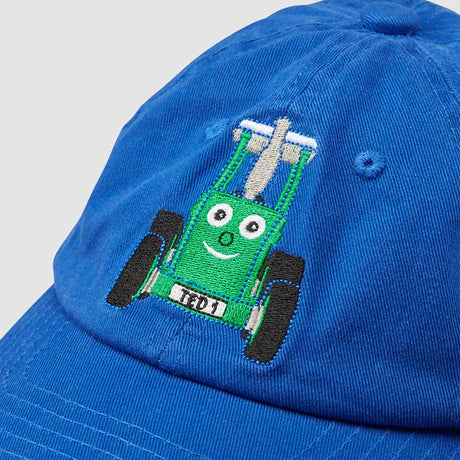 Close up of embroidered Tractor Ted character logo detail on blue cotton cap