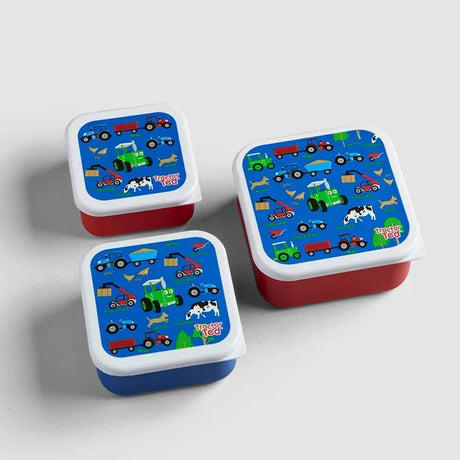 Tractor Ted Farmyard Snack Pots showing three different sized red and blue containers with illustrated lids featuring tractors, trailers, cows and farm animals.