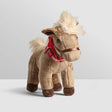 Tractor Ted Herb The Pony Soft Toy front view showing soft brown fur, cream nose, stitched smile, red rosette on ribbon collar and brown hooves
