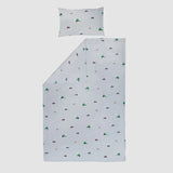 Full lay flat view of blue Tractor Ted & Midge duvet cover and matching pillowcase displaying green tractors, brown dog character and farm themed print