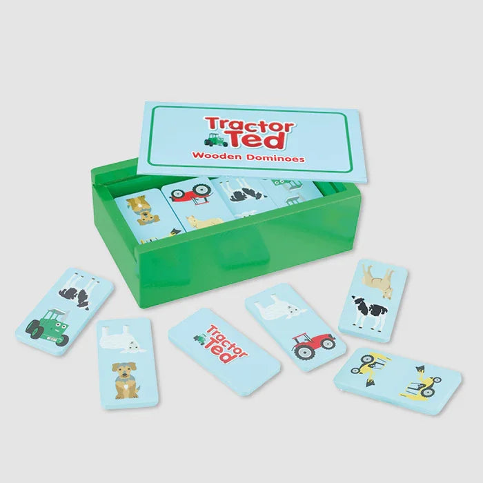 Tractor Ted Wooden Farm Dominoes pieces laid out beside green sliding lid storage box