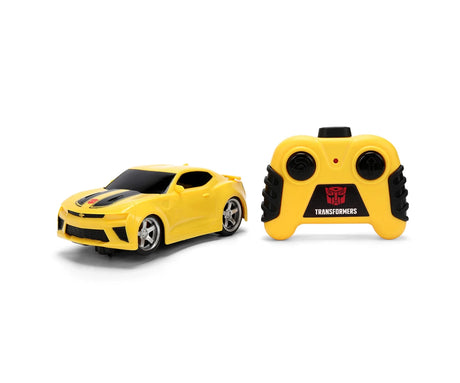Transformers Bumblebee RC 1:32 yellow Chevrolet Camaro with black bonnet stripes, silver wheels and matching yellow remote controller with black buttons and Transformers branding.