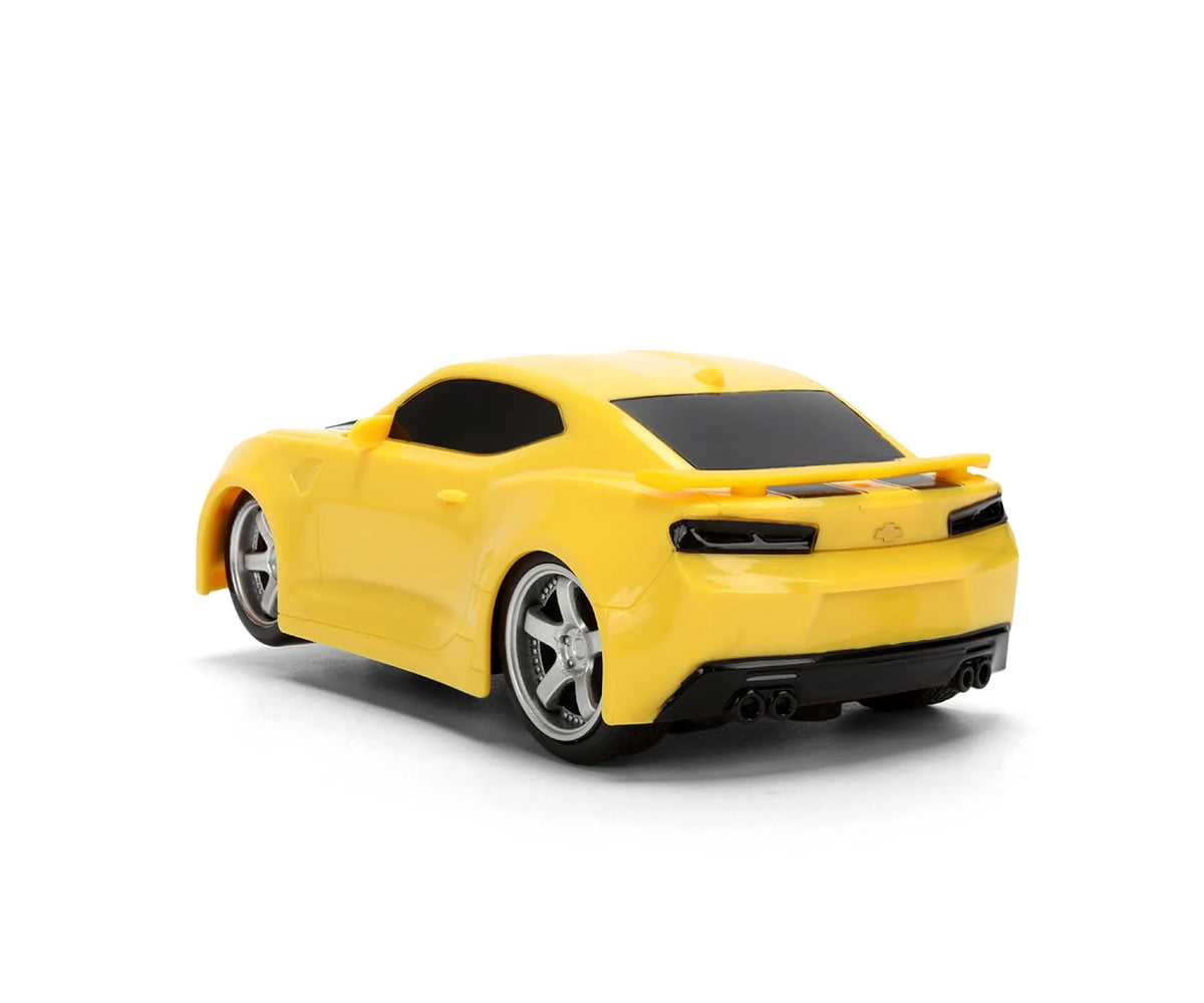 Transformers Bumblebee RC Chevrolet Camaro viewed from the rear and side, showing its yellow bodywork and silver wheels.