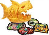Treasure X Shark Dissection gold moulded shark figure shown open with four illustrated collectible sticker cards laid out in front
