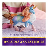 Child playing with Unicorn Academy Glow Magic Skywind on a bed