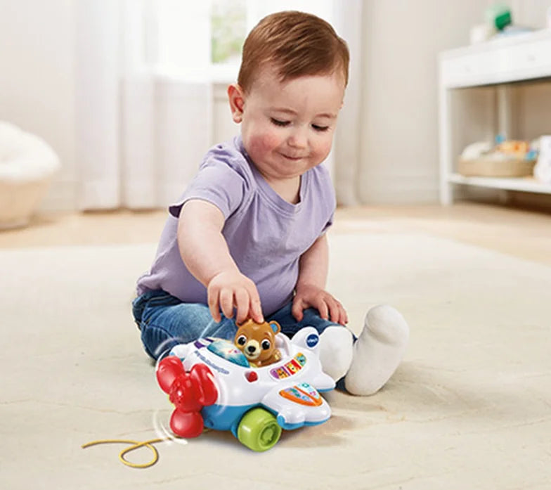 Baby playing with VTech 123 Fly with Me Aeroplane Toy – Ireland