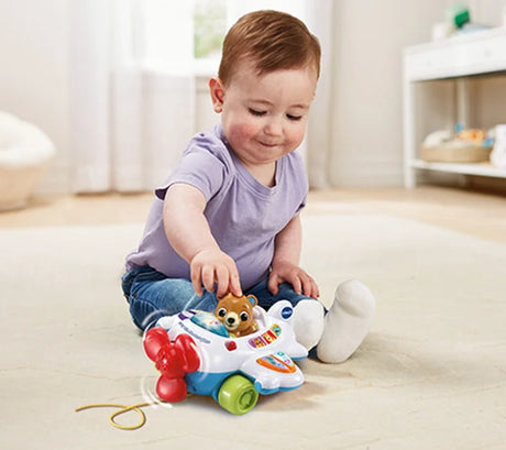 Baby playing with VTech 123 Fly with Me Aeroplane Toy – Ireland