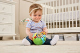 Toddler playing with VTech Animal Discoveries Ball on carpet in nursery setting – Ireland.