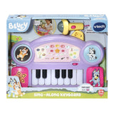 VTech Bluey Sing-Along Keyboard in retail packaging with microphone, piano keys and Bluey character artwork