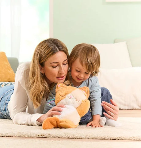 Child and parent playing with VTech Calming Purrs Kitten plush toy with sounds and lights – Ireland