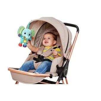 Baby holding VTech Cuddle & Sing Elephant Soft Toy in stroller – Ireland