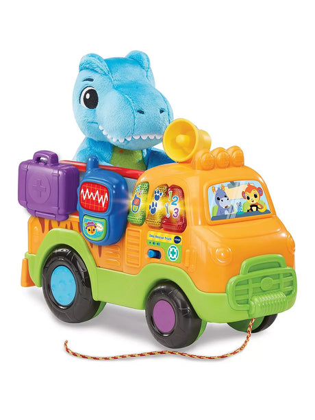 VTech Dino Rescue Truck with plush blue T-Rex dinosaur sitting in the rescue vehicle – Ireland.