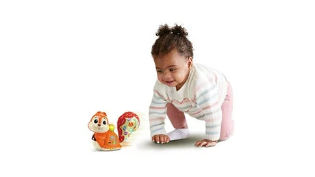 Baby crawling with VTech Follow Me Learning Squirrel toy – Ireland
