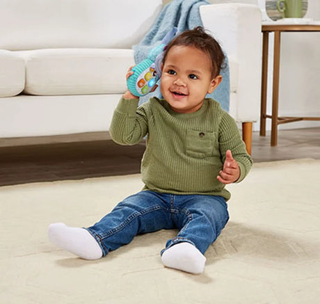 Baby playing with VTech Hello Hippo Phone Baby Toy – Ireland
