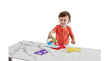 Toddler playing with VTech Ironing Time Learning Set toy and pretend clothes – Ireland