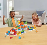 Children playing with the VTech Marble Rush Launch Pad built with ramps, towers, launchers and coloured marbles