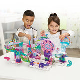 Two children playing with the VTech Marble Rush Petal Power marble run on a tabletop at home – Ireland.