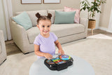 Child playing with the VTech Mix It Up DJ electronic toy – Ireland.