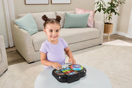 Child playing with the VTech Mix It Up DJ electronic toy – Ireland.