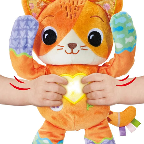 VTech Peek-a-Boo Paws toy being squeezed with glowing heart and raised paws – Ireland