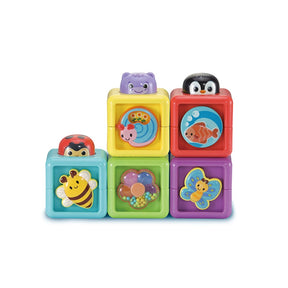 Five VTech Pop-a-Blocks stacked together with a ladybird, purple animal and penguin heads, plus colourful animal pictures on the front