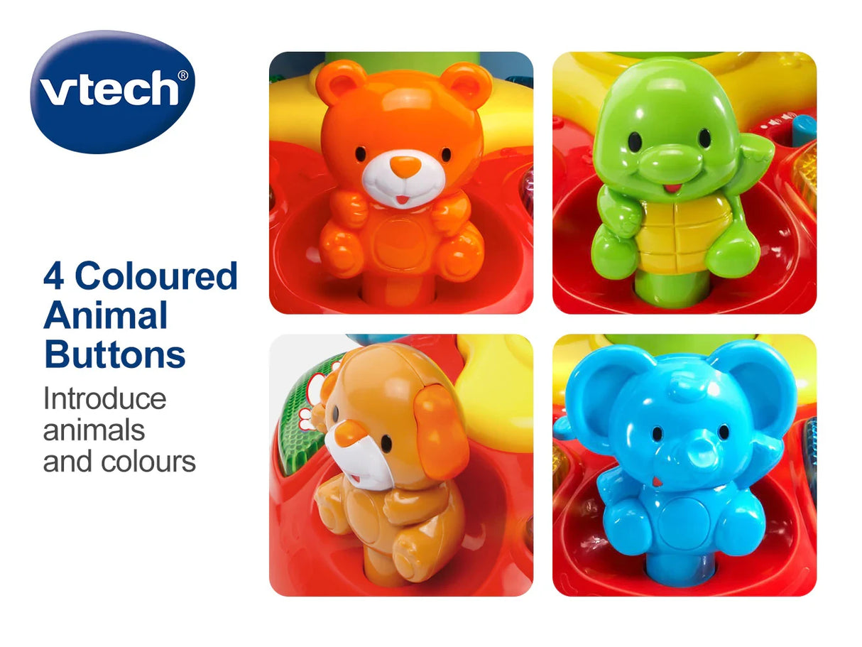 VTech Push and Play Spinning Top detail image showing four coloured animal buttons