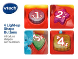 VTech Push and Play Spinning Top detail image showing four light up shape buttons