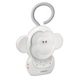 Three quarter view of the VTech Myla the Monkey Portable Soother with its grey hanging loop and front controls