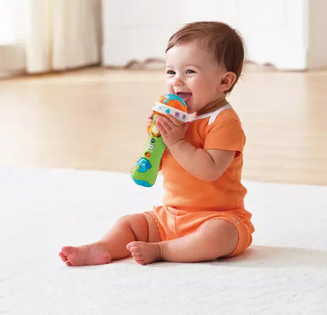 Baby playing with VTech Sing Along Microphone Toy – Ireland