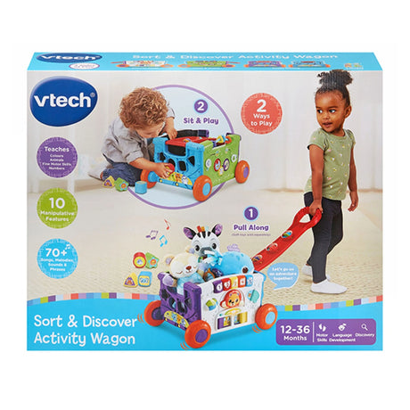 VTech Sort & Discover Activity Wagon boxed front view showing toddler pulling wagon and sit and play illustration