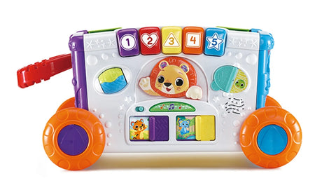 Side view of VTech Sort & Discover Activity Wagon showing activity panel with number buttons gears sliders and orange wheels
