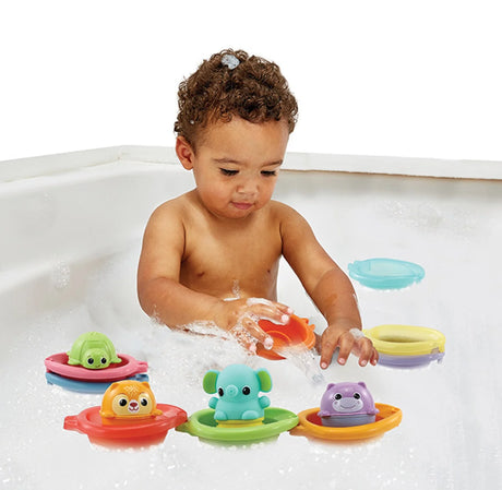 Child playing with VTech Stack and Splash Bathtime Boats in bath – Ireland.